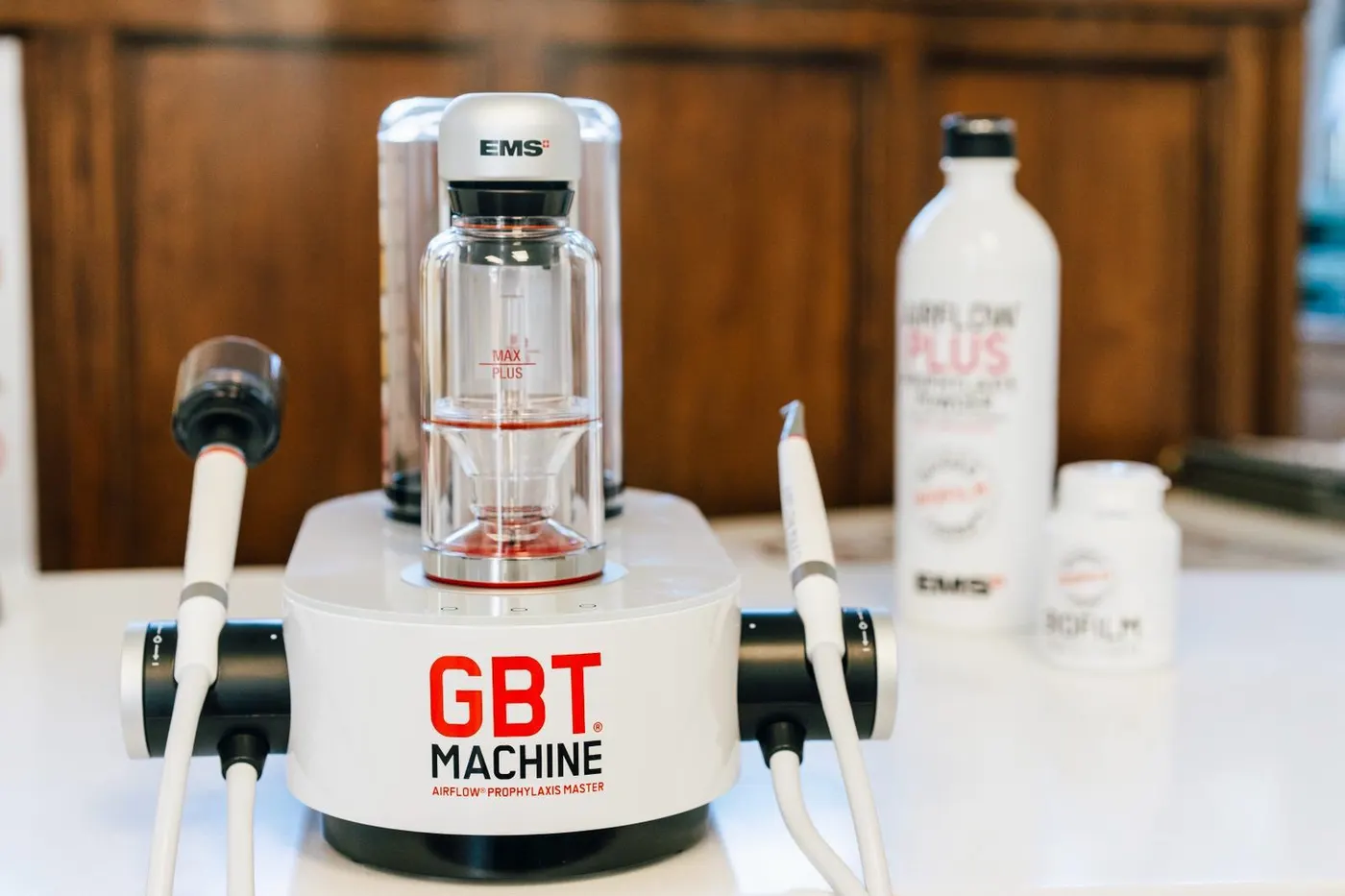The EMS GBT machine with AirFlow Plus prophylaxis powder, in a QueensWood surgery